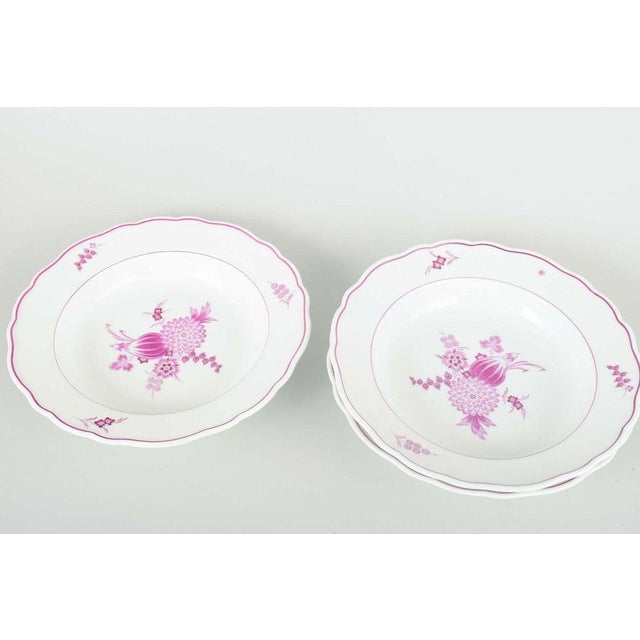 Meissen, Germany 3 deep plates, early 20th century. Set of three deep porcelain plates, hand-painted with floral...