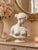 Inspired by one of the most admired neoclassical sculptures, The Greek Slave represents dignity, resilience, and enduring...