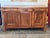 Early 20th century French walnut enfilade with good figure throughout, especially across the door panels. Three drawers...