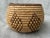 Small vintage, fine woven geometric coil basket. Simple dark brown rim and diamond shapes around the sides against a...