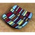 This vintage ceramic tile dish is a vibrant study in mid-century abstraction, its gently upswept, square-cut form giving...
