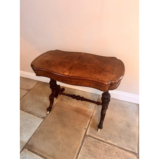 Outstanding quality antique Victorian burr walnut card table, having a outstanding quality antique Victorian card table,...