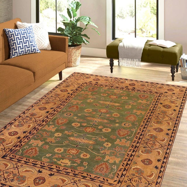 Designed with mesmerizing intricacy and gorgeous color palette, this hand-knotted masterpiece is an semi-Vintage...