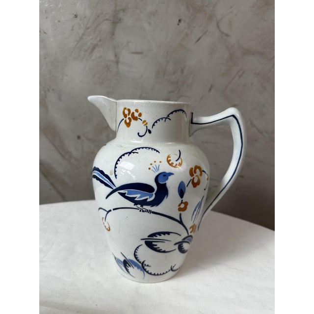Charming Art Nouveau Lunéville earthenware coffee service, dating from the early 20th century, signed on the base. This...
