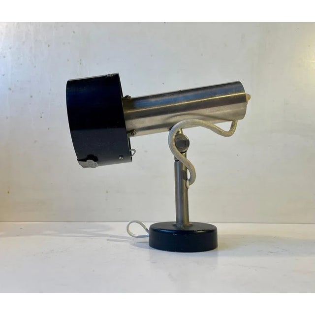 Some danish auction houses attributes the design of this adjustable wall light to preben fabrisius and jorgen kastholm....