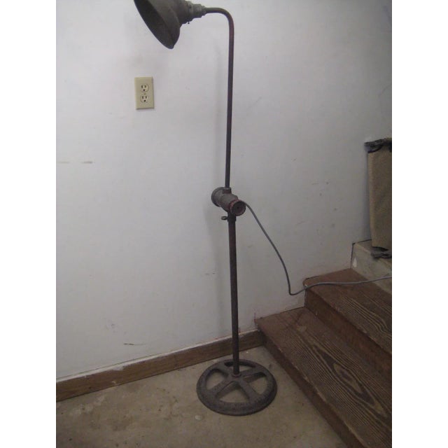 INDUSTRIAL Age Articulating Floor Lamp made by the Manley Manufacturing Company in York PA stamped on the iron base. The...