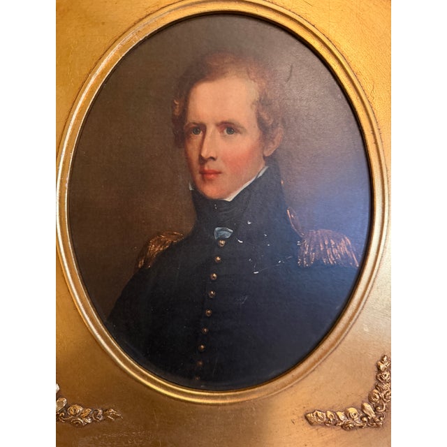 Matched pair of gold-framed oval portrait prints on board. Left: "Major Biddle," after Thomas Sully's 1818 portrait....