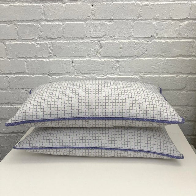 Handmade pillows are zippered and have beautifully made pipings. Hand-sewed cord piping along the edges adds more appeal...