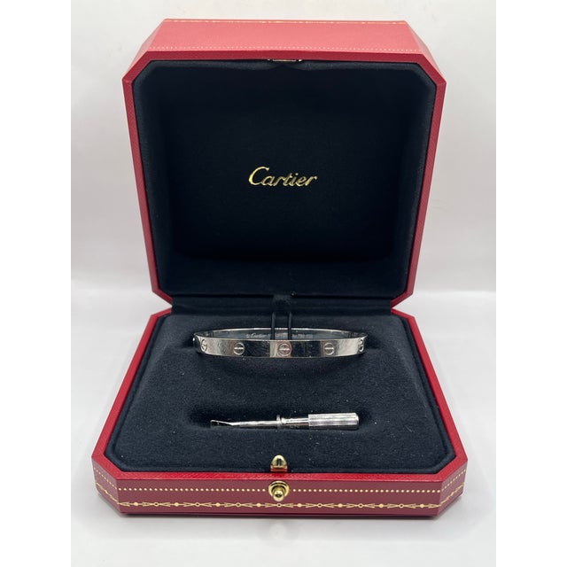 Timelessly elegant and unmistakably iconic, this Cartier Love Bracelet is crafted from luxurious 18k white gold,...