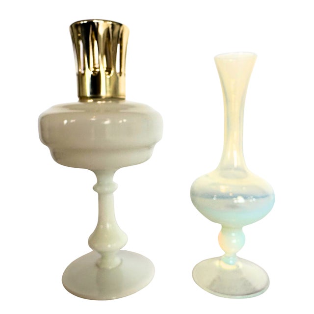 A rare french collectible set pairing a vintage lampe berger fragrance lamp in white opaline glass with its gilt crown,...