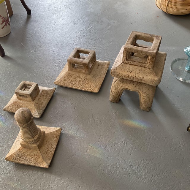 Elevate your outdoor space with these beautifully crafted stone pagoda-style garden ornaments, inspired by traditional...