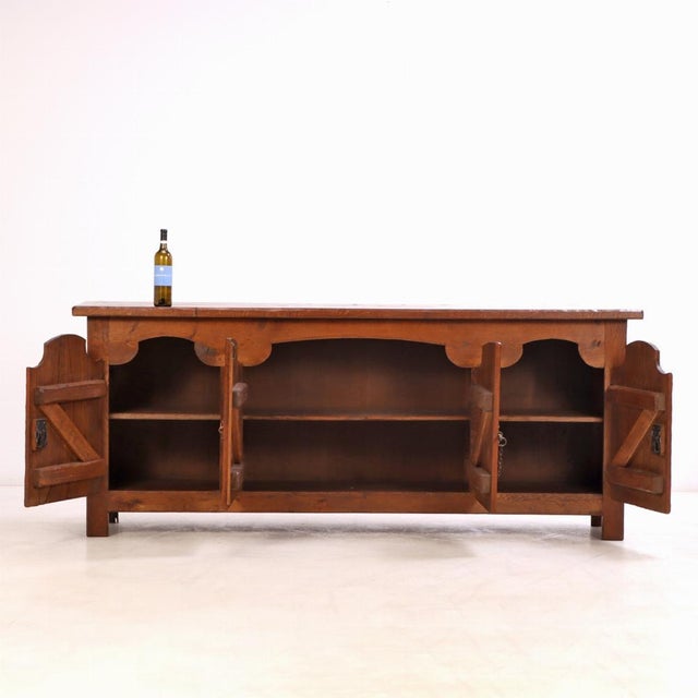 A striking French oak sideboard designed in the Brutalist style. Crafted from solid oak, it features bold lines,...