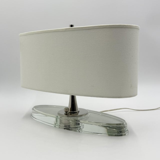 Elegant “Casper” desk or table lamp designed by Thomas O’Brien for Visual Comfort, featuring a sculptural combination of...