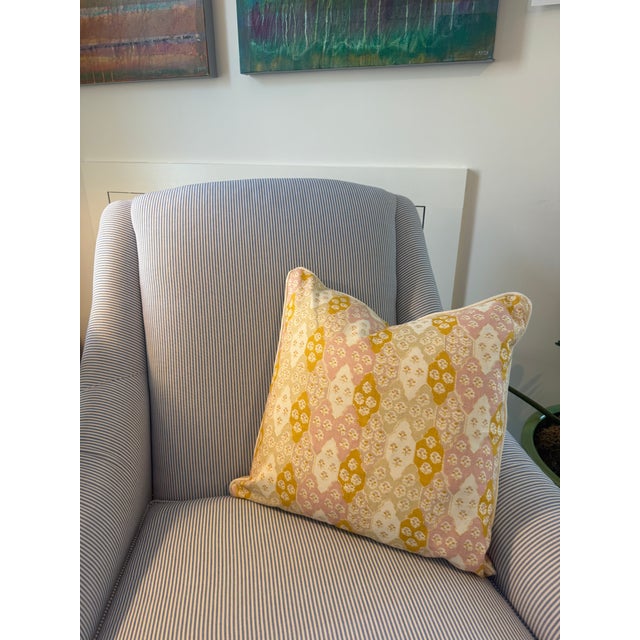Alice Sergeant's Fabric in the pattern: Ottoman Quilt and color: Petal. Yellow and pink pillow cover printed on oyster...