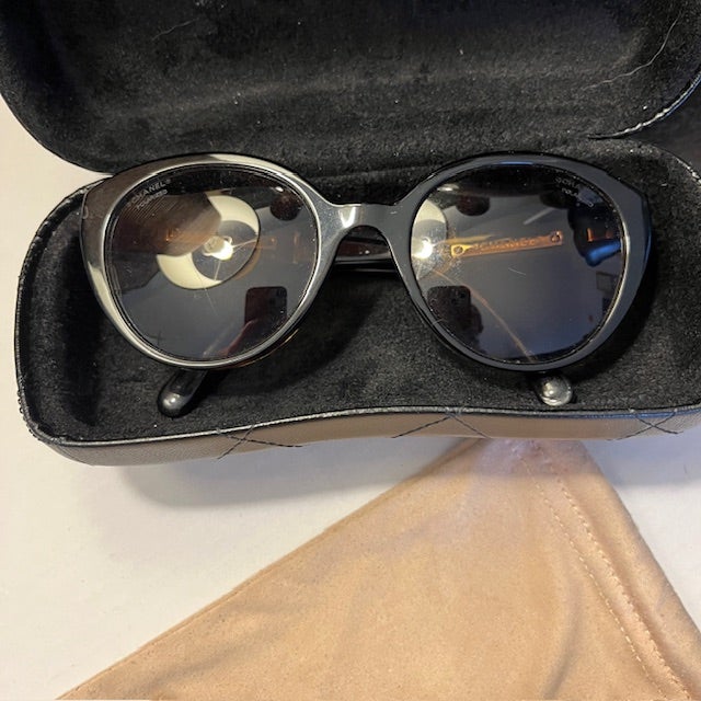 Stylish, classic Chanel sunglasses with tortoise shell frames and interlocking Chanel CC logo on stems. Polarized. Etched...