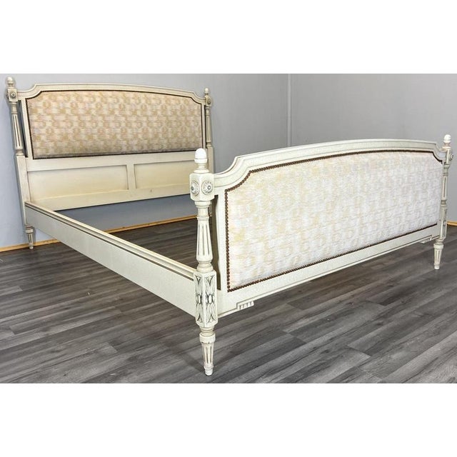 This Vintage shabby chic king size upholstered bed frame features elegant painted detailing and soft neutral upholstery,...