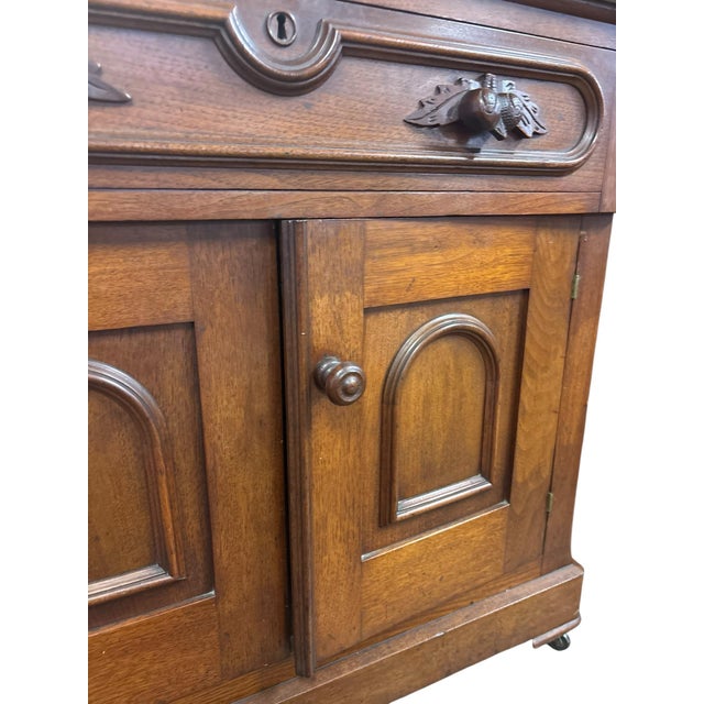 Bring timeless Victorian elegance into your home with this beautifully preserved Eastlake marble-top washstand dating to...