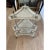 This is a three tiered side table by Jacques Garcia for Baker Furniture, it is rather heavy, very solid, is made of metal...