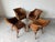 Beautiful set of four vintage Palecek-style dining chairs featuring an elegant, organic coastal design. These chairs are...