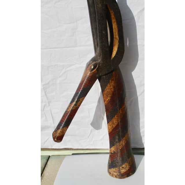 Large wooden antelope mask from the Krumba Adone in Upper Volta. Tribal traditional art, large sculptural antelope head in...