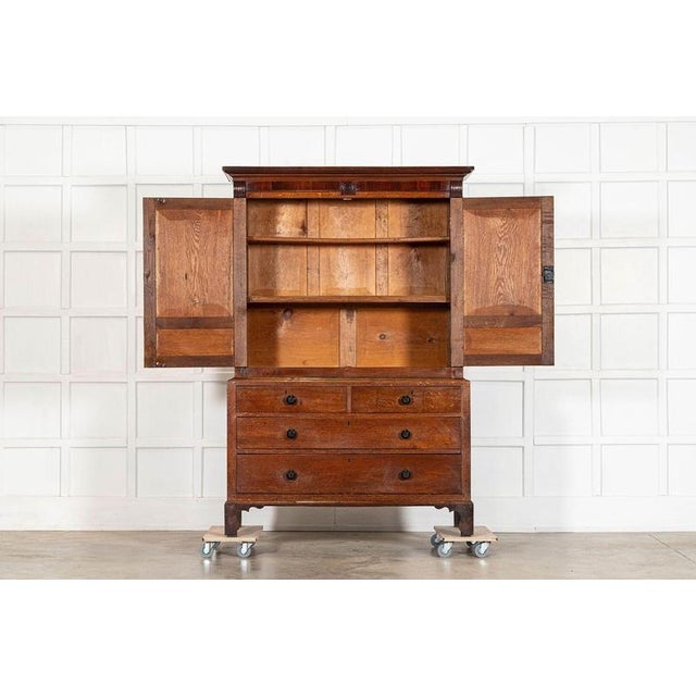 Circa 1820 large 19thc english georgian oak housekeepers cupboard together w134.5 x d52 x h199.5 cm base w133 x d51.5 x...