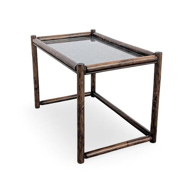 We are offering a beautiful vintage coffee table made of bamboo and glass for sale. This Italian-made table impresses with...