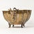 Large vintage brass footed centerpiece bowl with scalloped edges and rams head handles and decorative feet. Has an aged...
