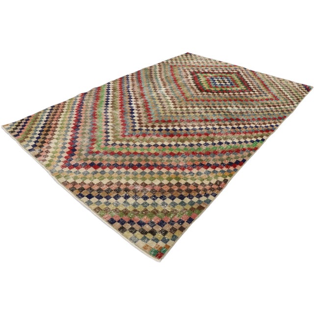 distressed vintage Turkish Sivas rug with Rustic Mid-Century Modern Cubist style. This hand knotted wool distressed...