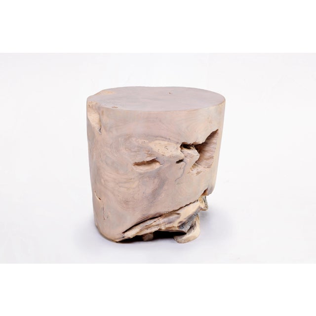 Inspired by the beauty of natural root form, this organic teak accent side table is handcrafted from one piece of salvaged...