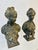 This small pair of classical-style busts are vintage figurines, likely made of spelter (a zinc alloy often used for...