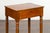 A petite English walnut side table from the early 19th century, with single drawer, turned legs and casters. Created in...