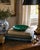 A beautifully proportioned brass rimmed malachite bowl in richly veined shades of green and black. The sculptural...