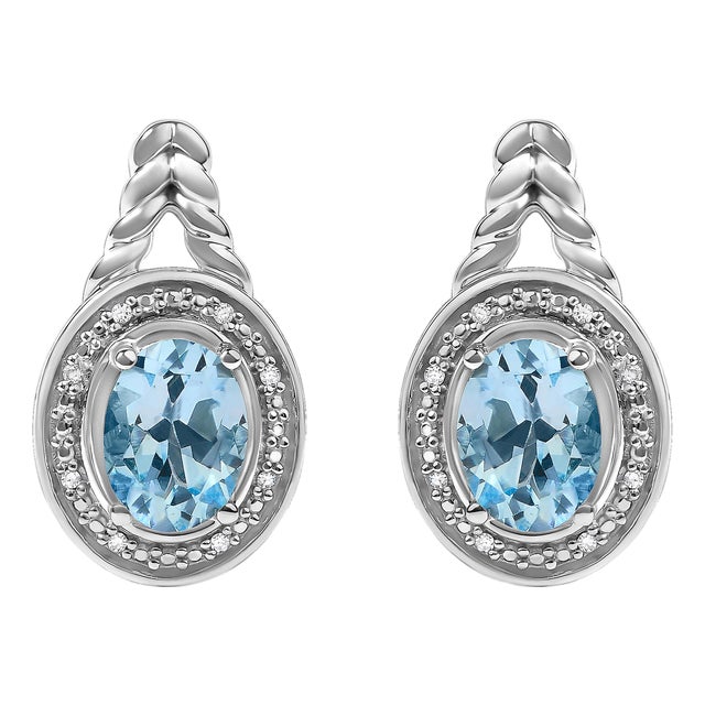 Sterling Silver Oval Blue Topaz and Diamond Accent Twist and Halo Drop Earrings, Pair For Sale
