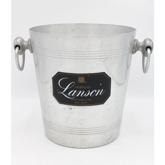 A superb vintage French champagne ice bucket, circa 1950. This is a stunning ice bucket with charming knobbed ring...