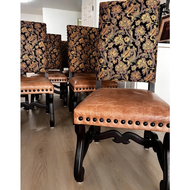 Elevate your dining space with this striking set of 8 Spanish Revival-style dining chairs, blending rustic elegance with...