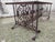 Wrought iron table base. Sold without tray. A glass slab would be interesting for this foot.