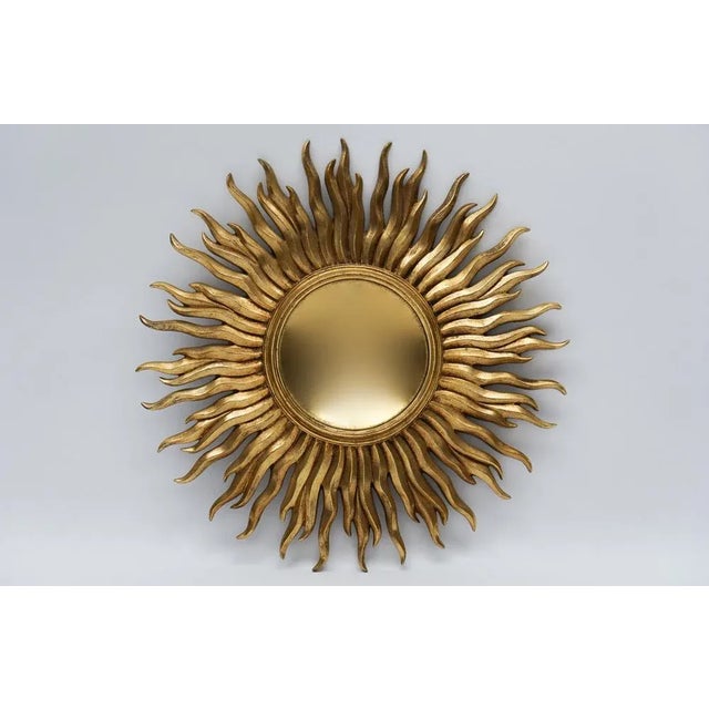 The glass of the mirror is curved, great quality.