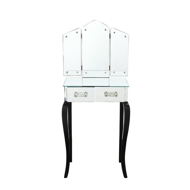 This stunning Art Deco Hollywood mirrored trifold vanity, crafted in the United States circa 1945, is an iconic example of...