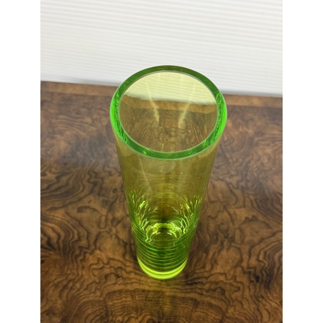 Design Plus Gallery presents Lime Green Tall Vase. It has a tall profile and is a delightful tone of lime green that is...