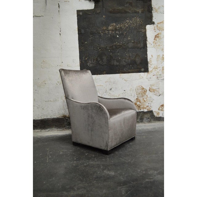 -graceful stylized armchair -upholstered in a neutral taupe crushed velvet. -firm seat