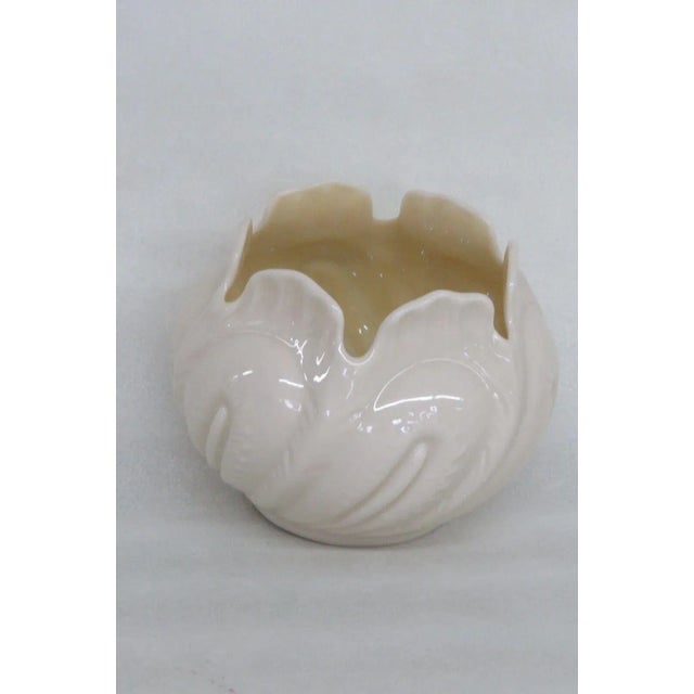 This gorgeous Vase is made of porcelain. This beautiful piece was made in Ireland by Belleek, the fine porcelain company,...