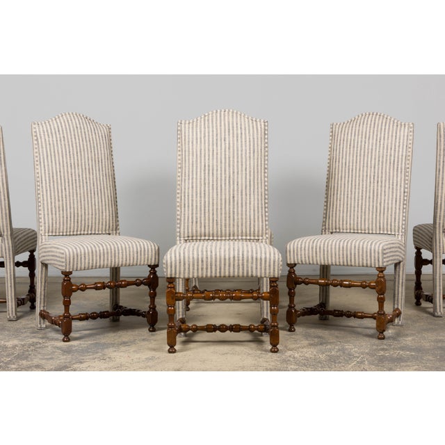 A modern, quietly luxurious interpretation of classic Louis XIII lines, these chairs blend French coastal softness with a...