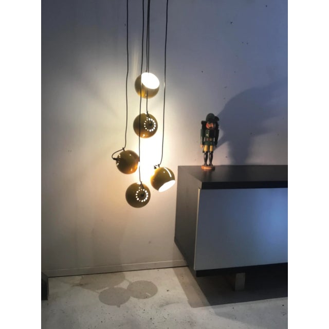 The white ceiling plate is not original. This piece is attributed to the mentioned designer/maker. It has no attribution...