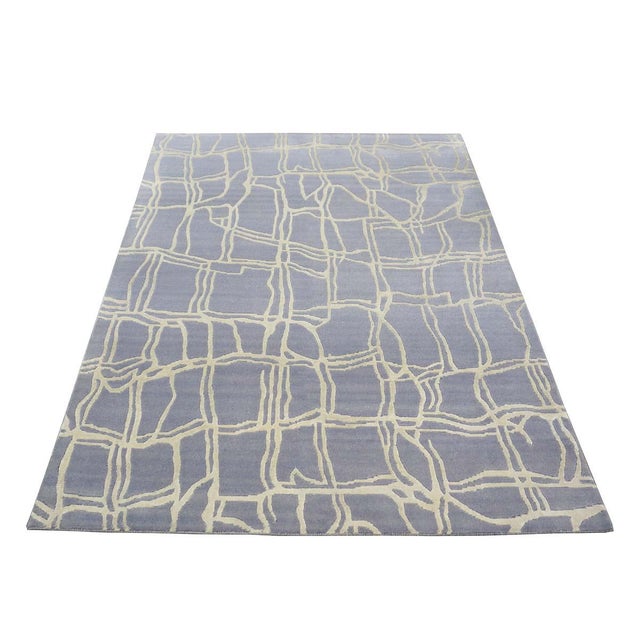 Condition: New Origin: Nepal Design: Modern Abstract Actual size: 4'7" x 6'7" Thickness: 1/2" Color: Slate Blue, Ivory,...