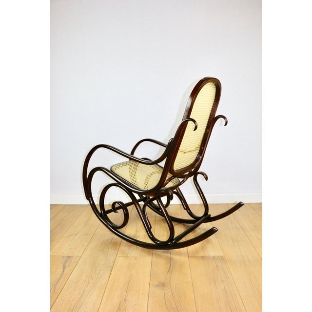 Rocking chair on runners, original brown, 1970s - very good condition. Brown rocking chair from the 1970s. Originally...