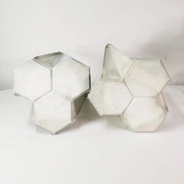 A pair of tables, manufactured by Yasp, Netherlands, 1970s (signed). They are characterized by a cubist, modernist form....