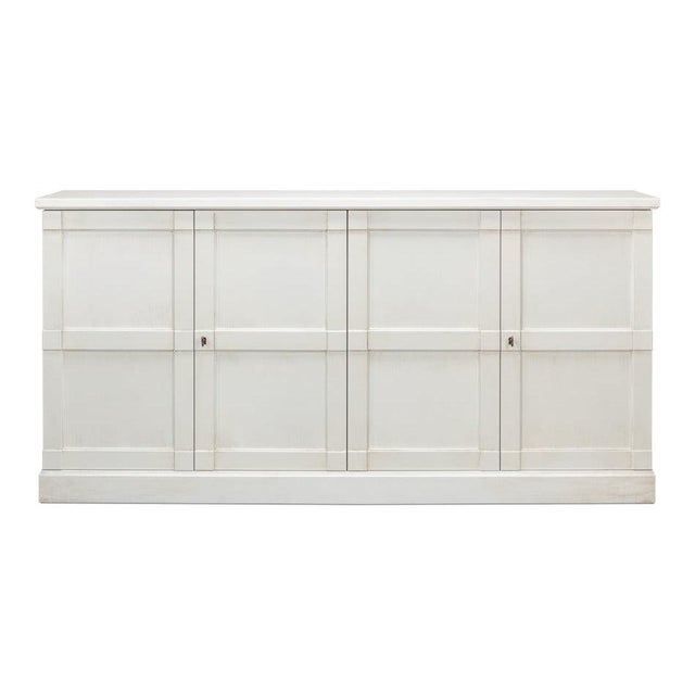 A shallow 15-inch profile leaves room for hallway traffic or pulled-back dining chairs, with 75 inches of storage enclosed...