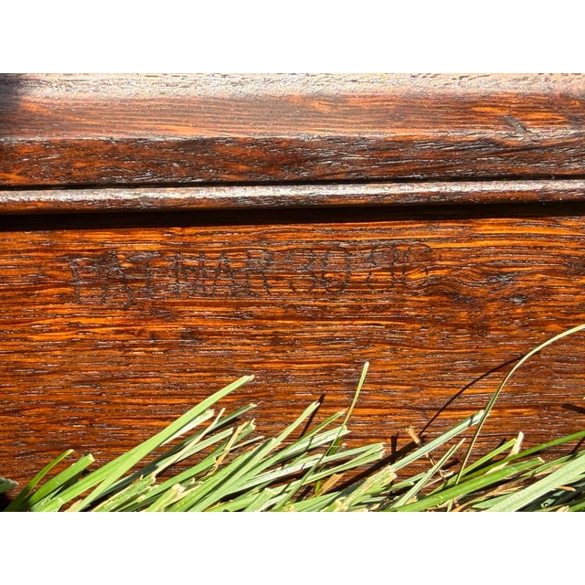 An exceptional and highly original antique oak library card catalog cabinet featuring 30 graduated drawers, rich quarter-...