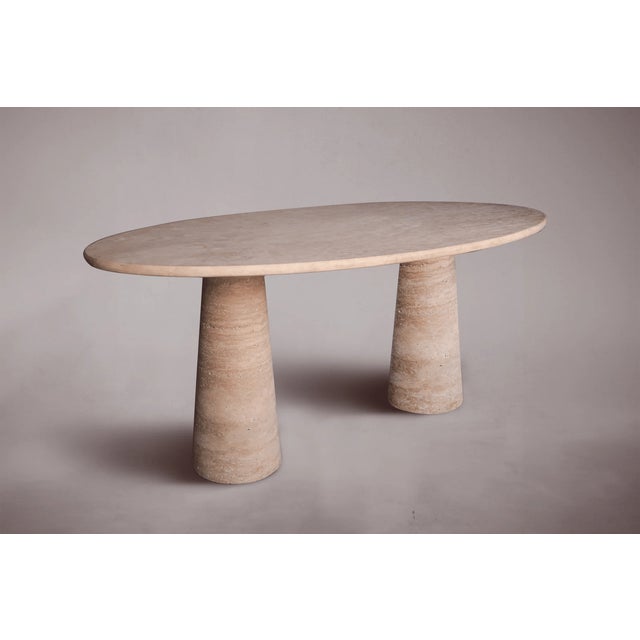 Elevate your dining experience with our double-pedestal travertine dining table. Crafted from premium travertine, renowned...