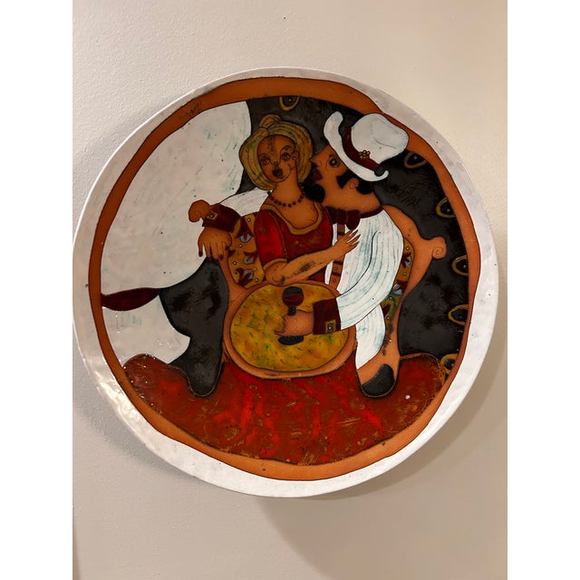Unique wall plate crafted by a local artisan that adds color and interest to any room. Definitely a conversation starter....